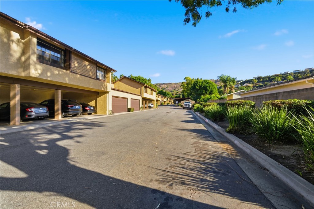 4140 Workman Mill Road, Unit 137 Whittier, CA 90601 - Photo 15 of 20 a view of a street with a building in the background