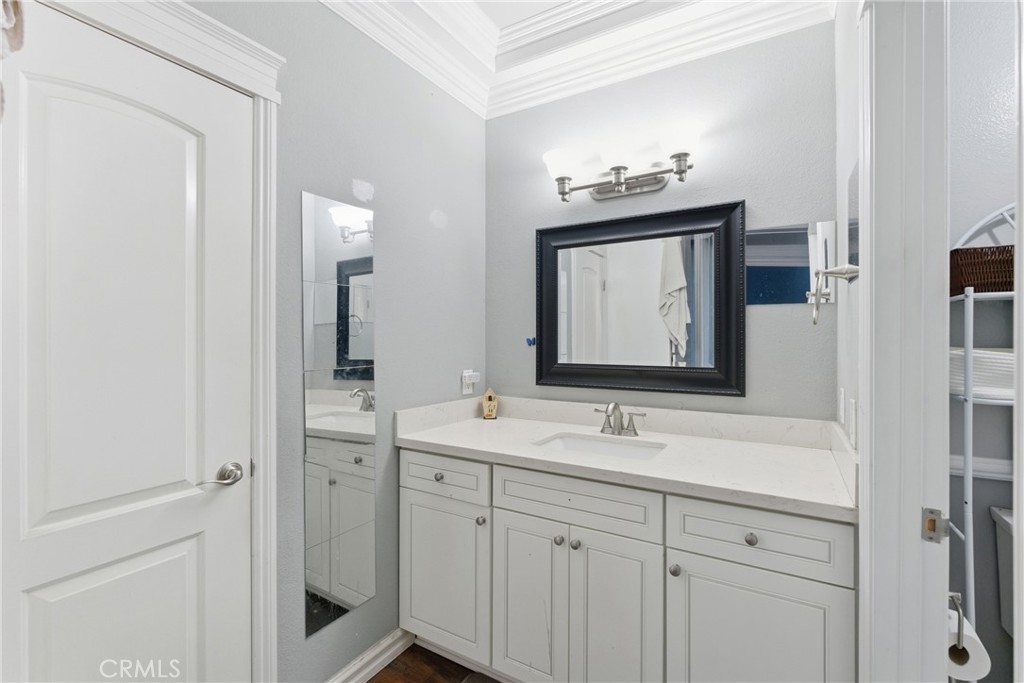 4140 Workman Mill Road, Unit 137 Whittier, CA 90601 - Photo 2 of 20 a bathroom with a sink and a mirror