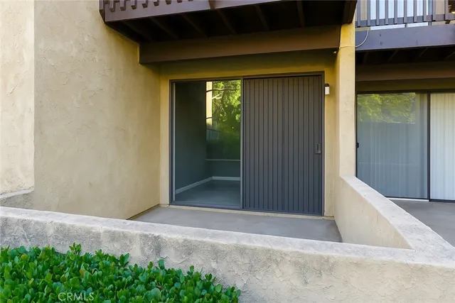 a view of a house with a wooden door