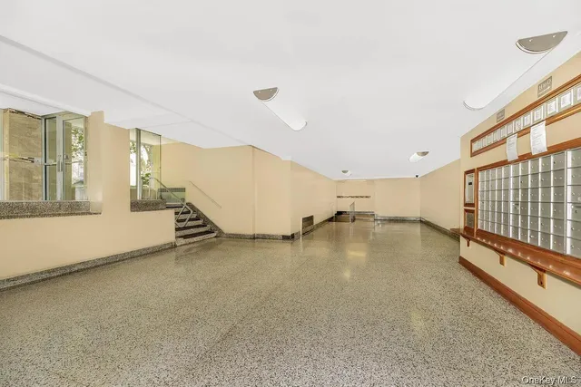 a view of a livingroom with furniture and a rug