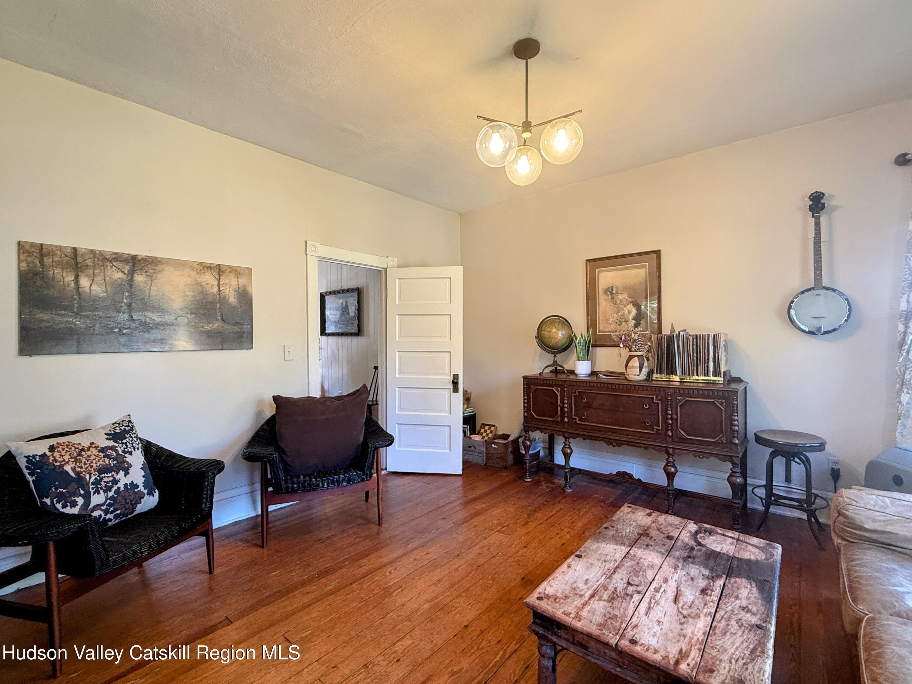 42-50 Stoney Clove Road Hunter, NY 12442 - Photo 20 of 82 a living room with furniture and a wooden floor