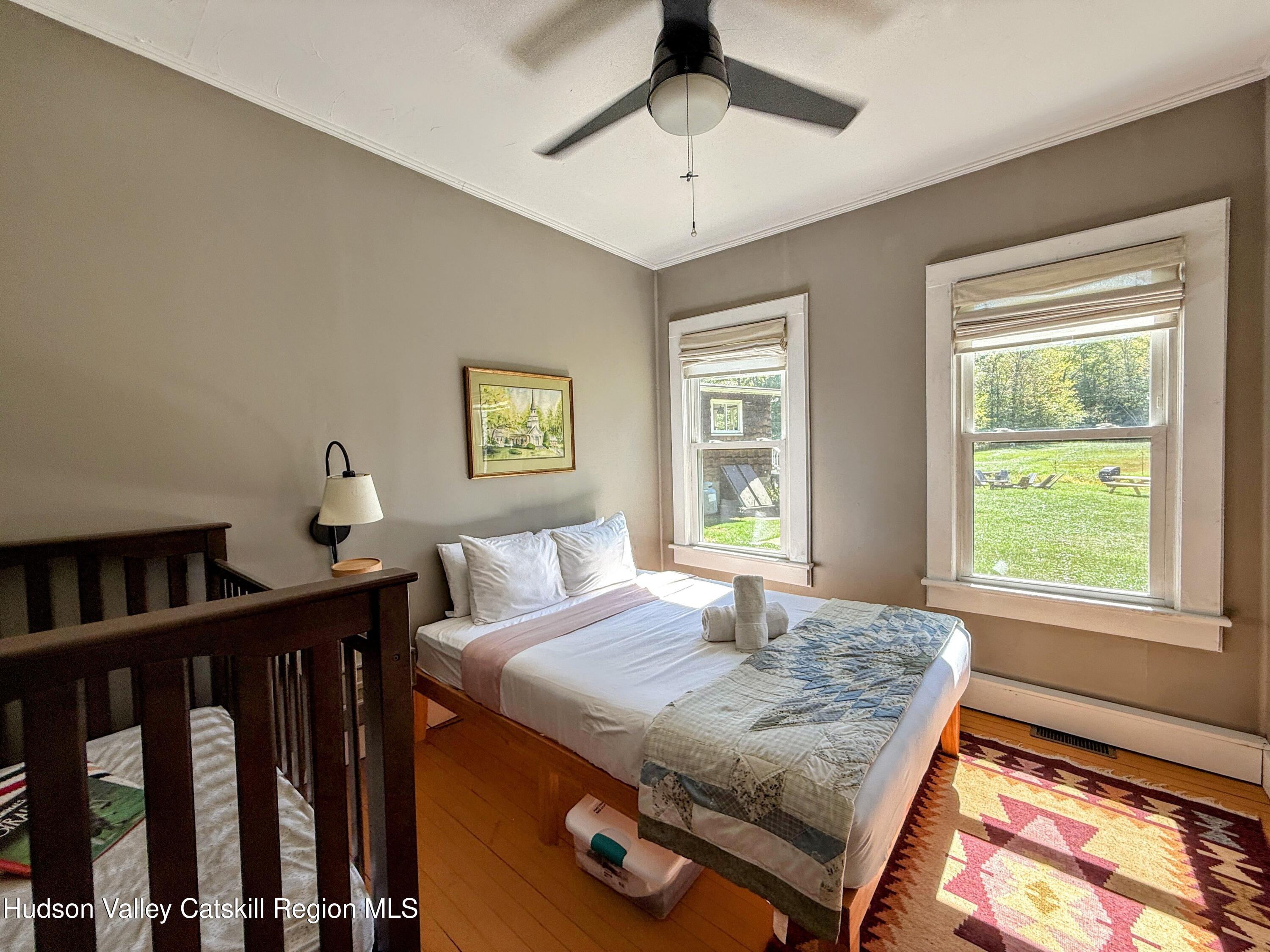 42-50 Stoney Clove Road Hunter, NY 12442 - Photo 45 of 82 a bedroom with a bed and a window