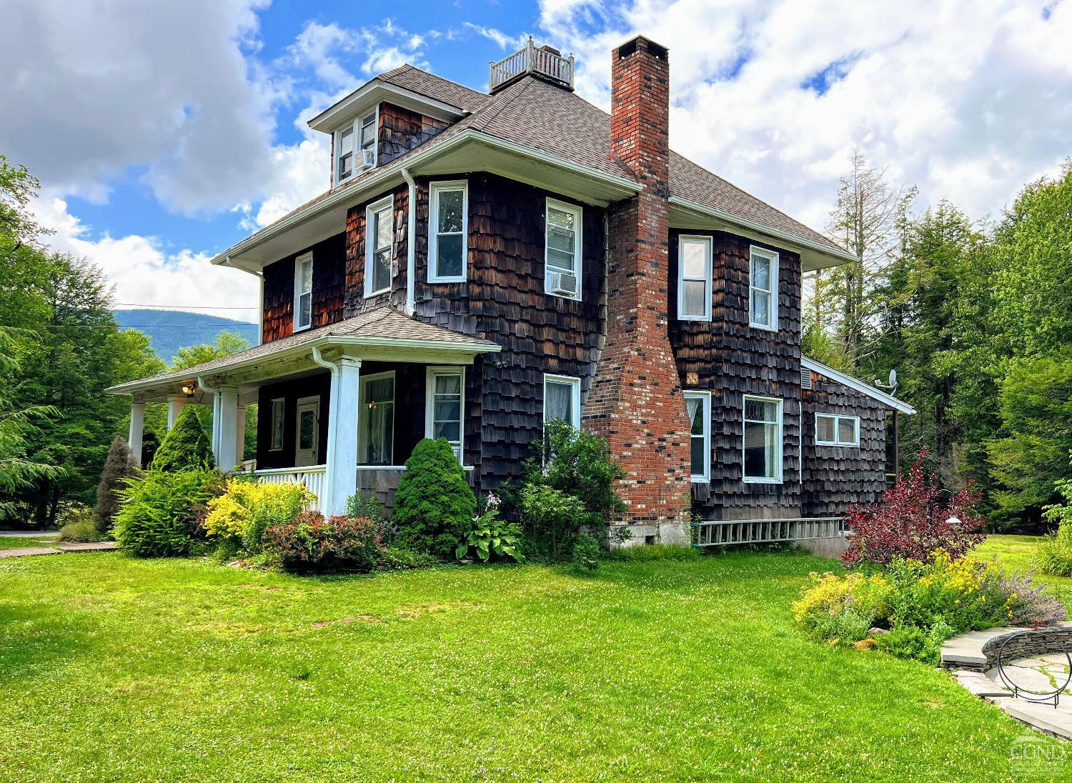 42-50 Stoney Clove Road Hunter, NY 12442 - Photo 5 of 82 a front view of a house with garden