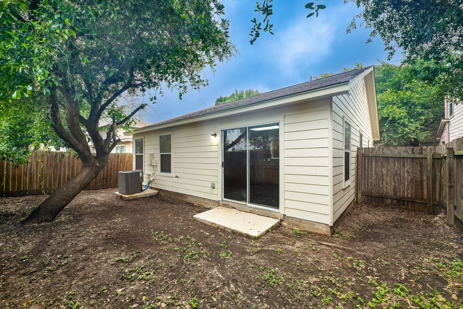6733 Doyal Drive Austin, TX 78747 - Photo 25 of 28 A private backyard oasis awaits, enclosed by a sturdy wood fence for ultimate seclusion.