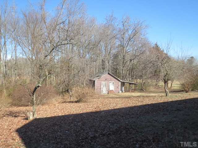 929 Old Allensville Road Roxboro, NC 27574 - Photo 3 of 6 a view of yard with tree in front of it