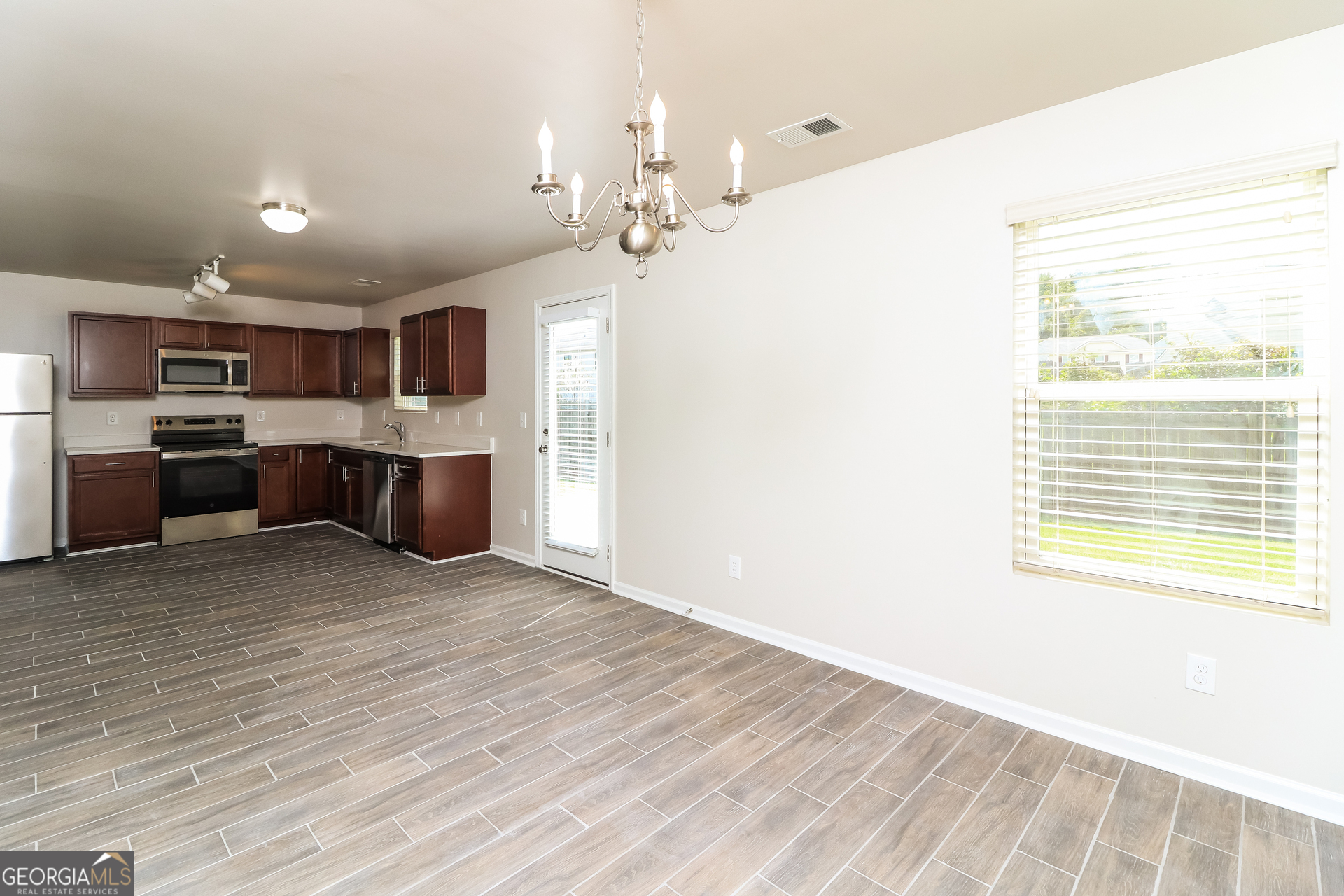 404 Scenic View Court Villa Rica, GA 30180 - Photo 7 of 17 a view of kitchen and window
