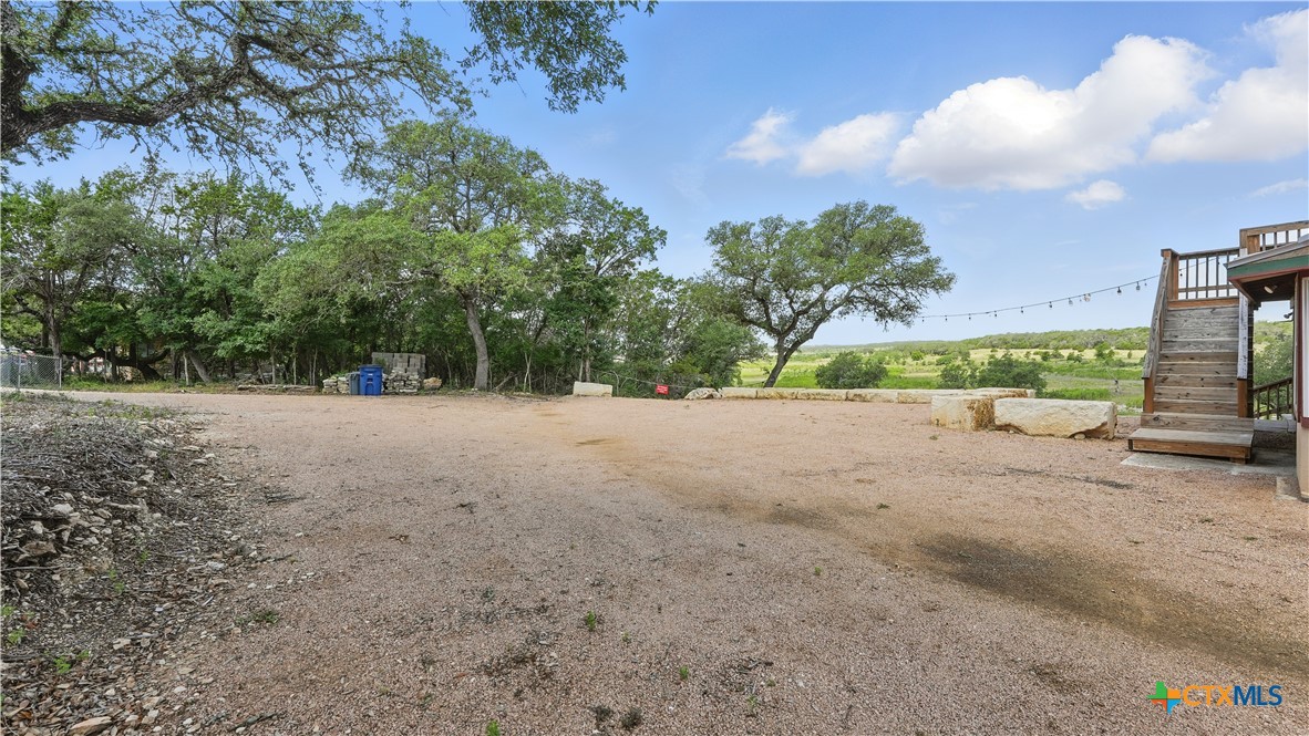 205 Bravo Road Canyon Lake, TX 78133 - Photo 25 of 38 a view of outdoor space and yard