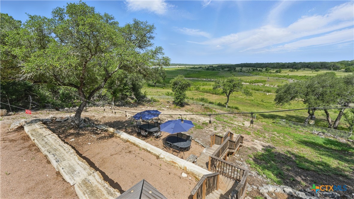 205 Bravo Road Canyon Lake, TX 78133 - Photo 36 of 38 a view of an outdoor space and a lake view