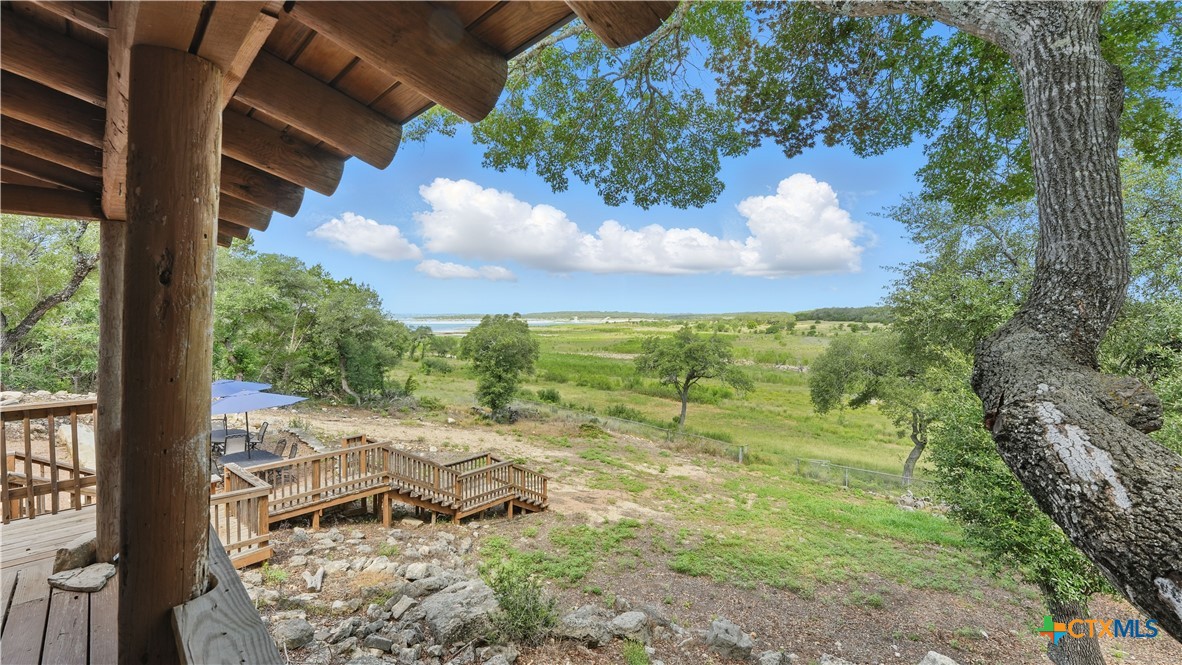 205 Bravo Road Canyon Lake, TX 78133 - Photo 38 of 38 a view of a backyard of the house