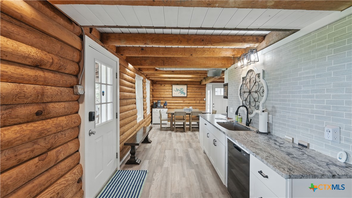 205 Bravo Road Canyon Lake, TX 78133 - Photo 10 of 38 a bathroom with a sink and a mirror