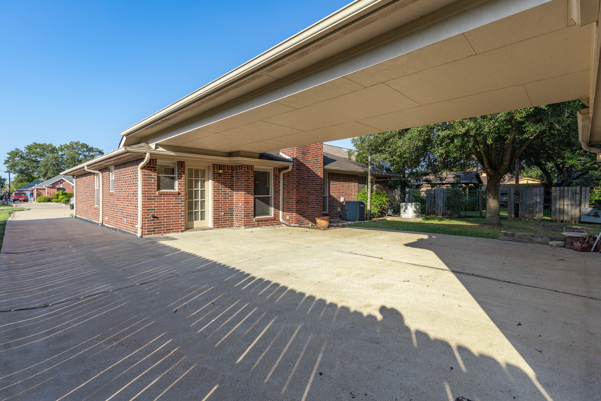 8018 Holiday Lane Houston, TX 77075 - Photo 36 of 42 a front view of a house with a yard