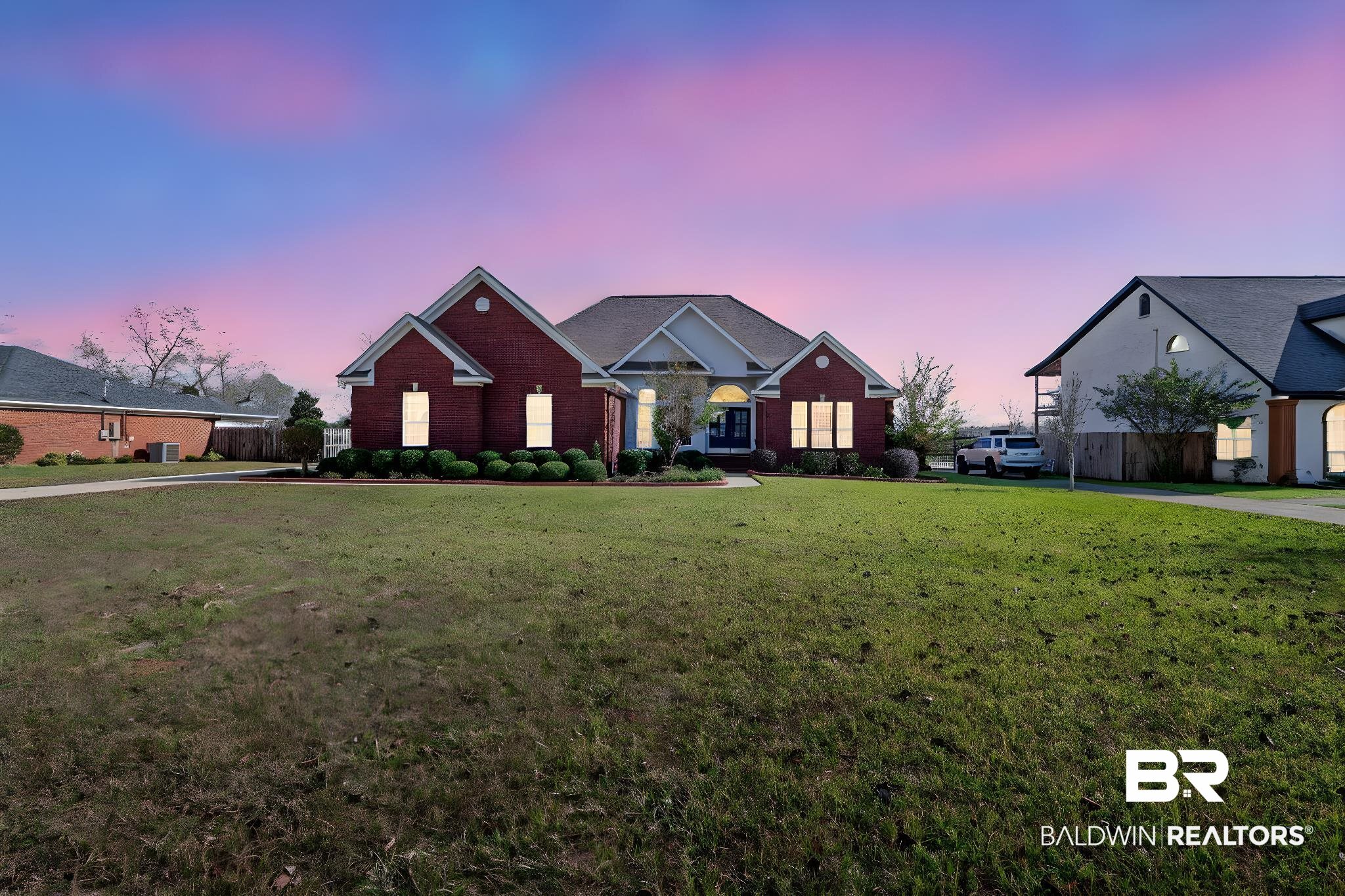 4771 Pecan Ridge East Mobile, AL 36619 - Photo 2 of 48 View of front facade with a front lawn and brick siding