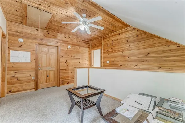 a view of a room with racks on the wall