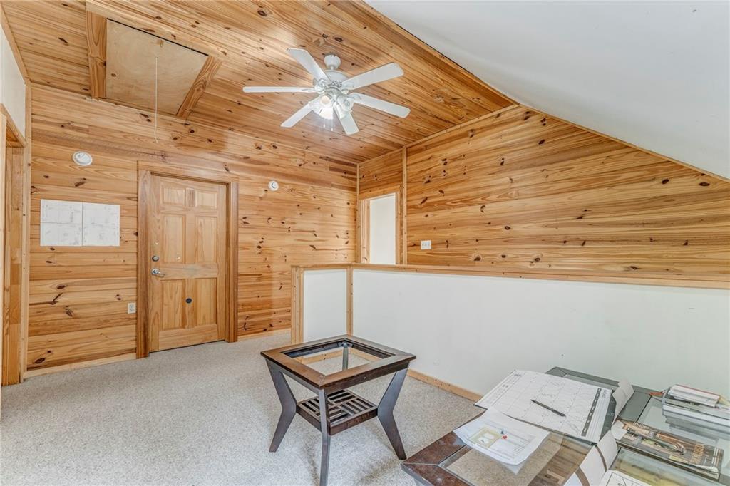 519 East Valley Road Northeast Rydal, GA 30171 - Photo 15 of 28 a view of a room with racks on the wall