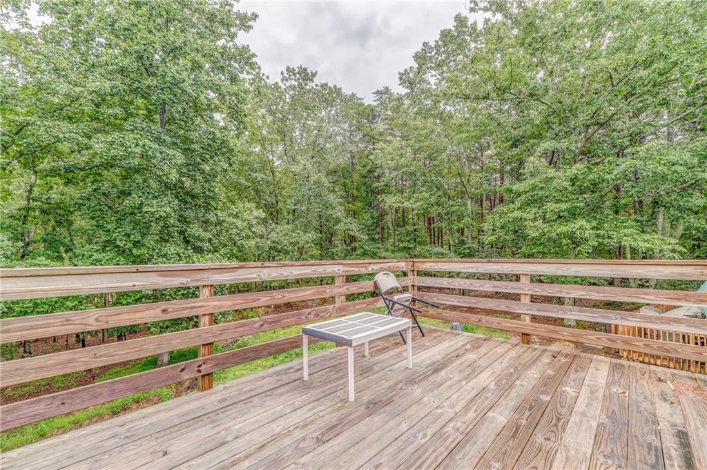 519 East Valley Road Northeast Rydal, GA 30171 - Photo 24 of 28 a view of backyard with deck and wooden floor
