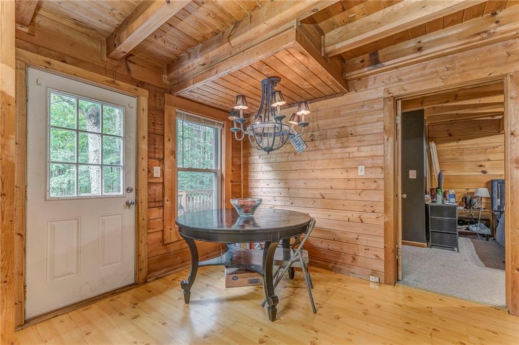 519 East Valley Road Northeast Rydal, GA 30171 - Photo 6 of 28 a view of a dining room with furniture and window