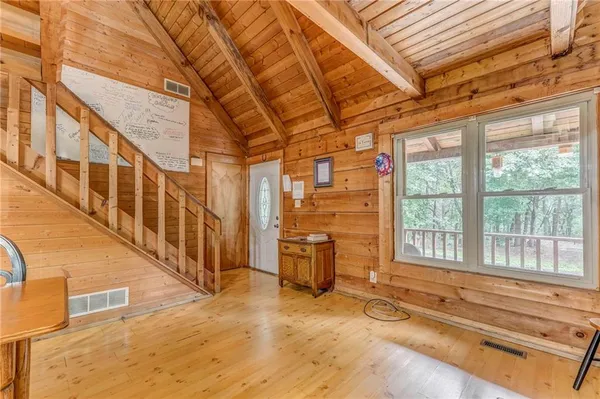 a view of an entryway with staircase