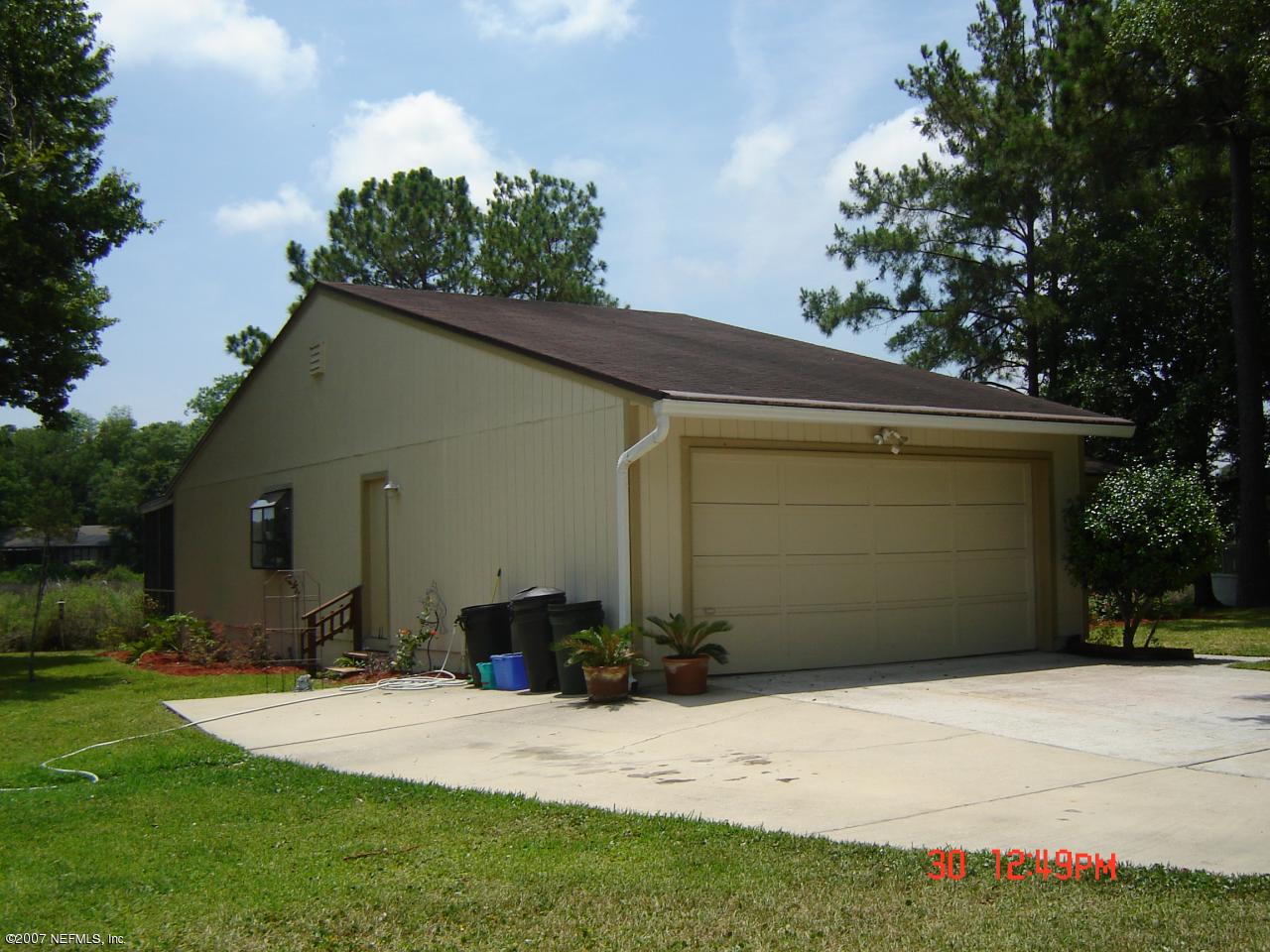 14326 Sandy Hook Road Jacksonville, FL 32224 - Photo 3 of 22 Side of Home w/ added parking area