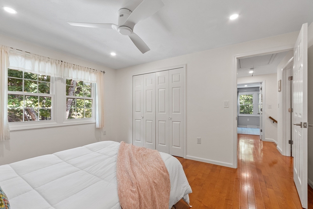 170 Mill Road, Unit 170 Chelmsford, MA 01824 - Photo 33 of 42 a bedroom with a bed and a window