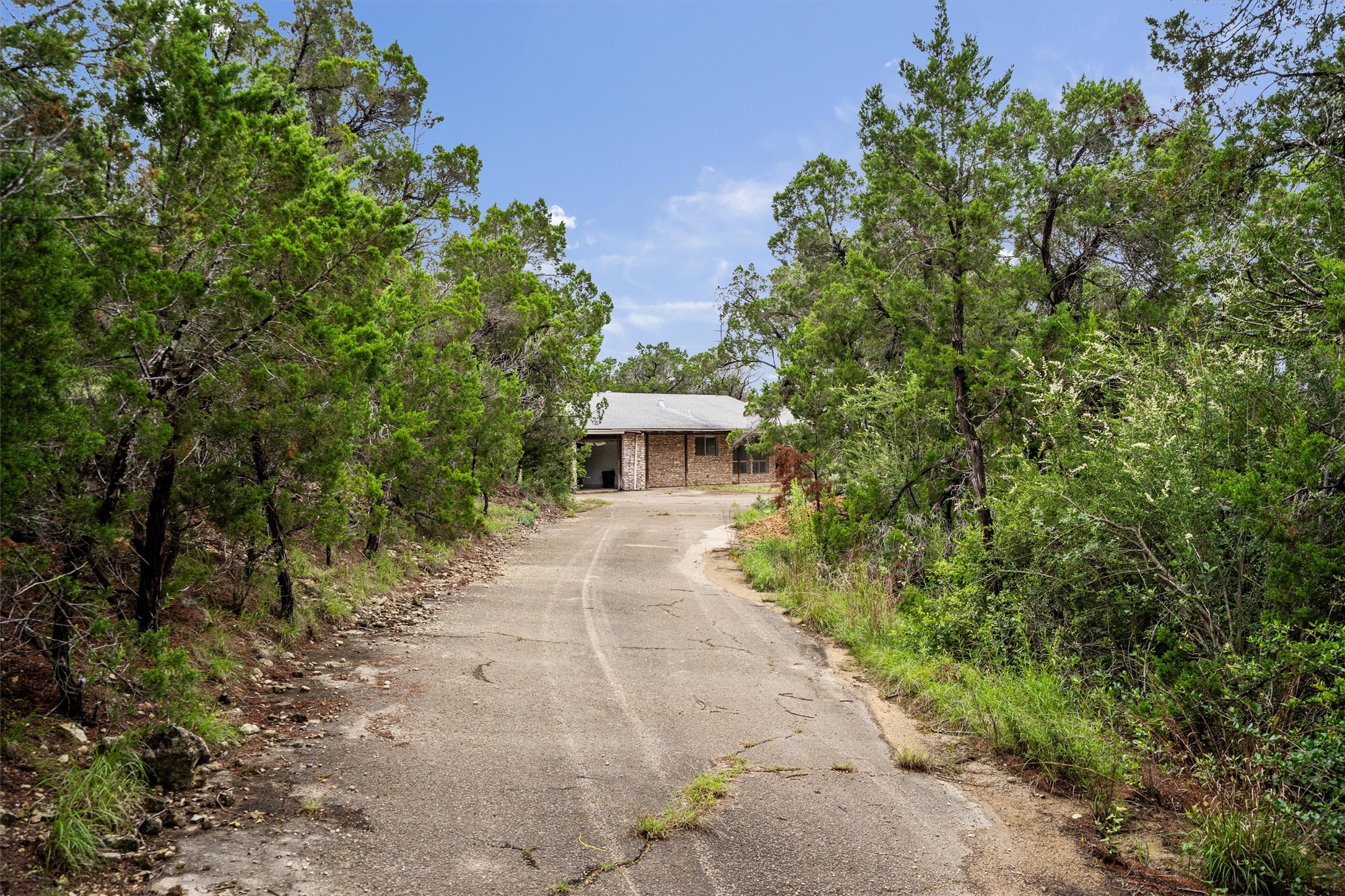 501 Drawbridge Road Austin, TX 78746 - Photo 2 of 6 The only house on Drawbridge Rd sits at the top of 5+ private acres.