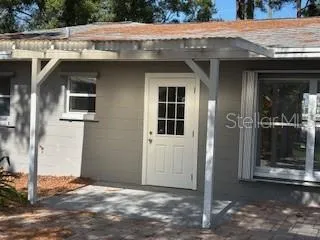 a view of a house with a porch