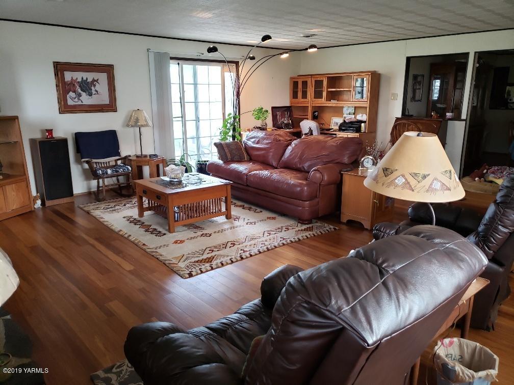 6235 Lateral A Road Wapato, WA 98951 - Photo 16 of 30 a living room with furniture chess board and a window