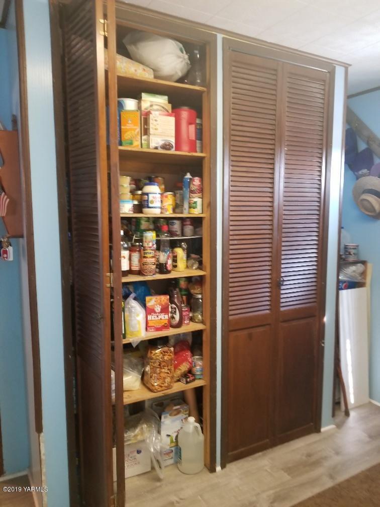 6235 Lateral A Road Wapato, WA 98951 - Photo 24 of 30 a room with wooden shelves