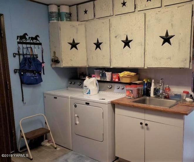 6235 Lateral A Road Wapato, WA 98951 - Photo 25 of 30 a room with storage and utility