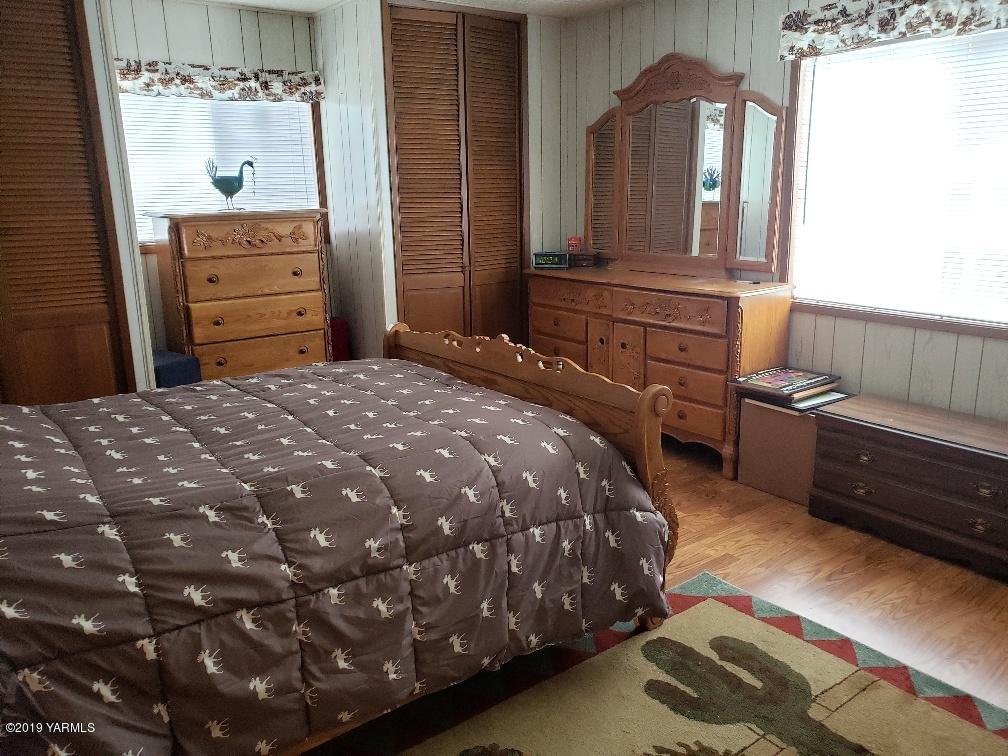 6235 Lateral A Road Wapato, WA 98951 - Photo 26 of 30 a bedroom with a bed and furniture