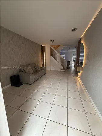 a view of a livingroom with furniture