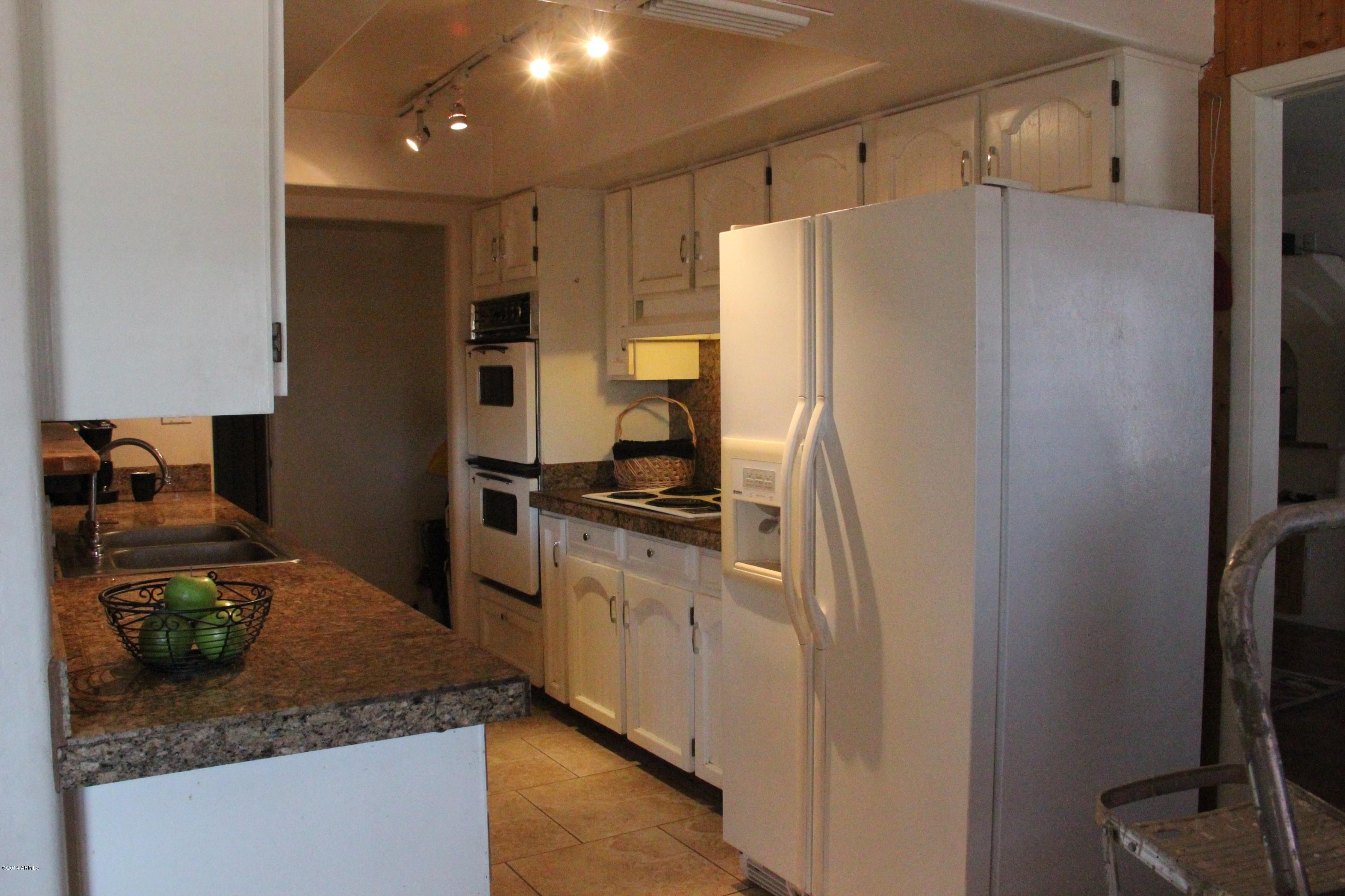 3915 West Calavar Road Phoenix, AZ 85053 - Photo 17 of 29 17-Kitchen-2