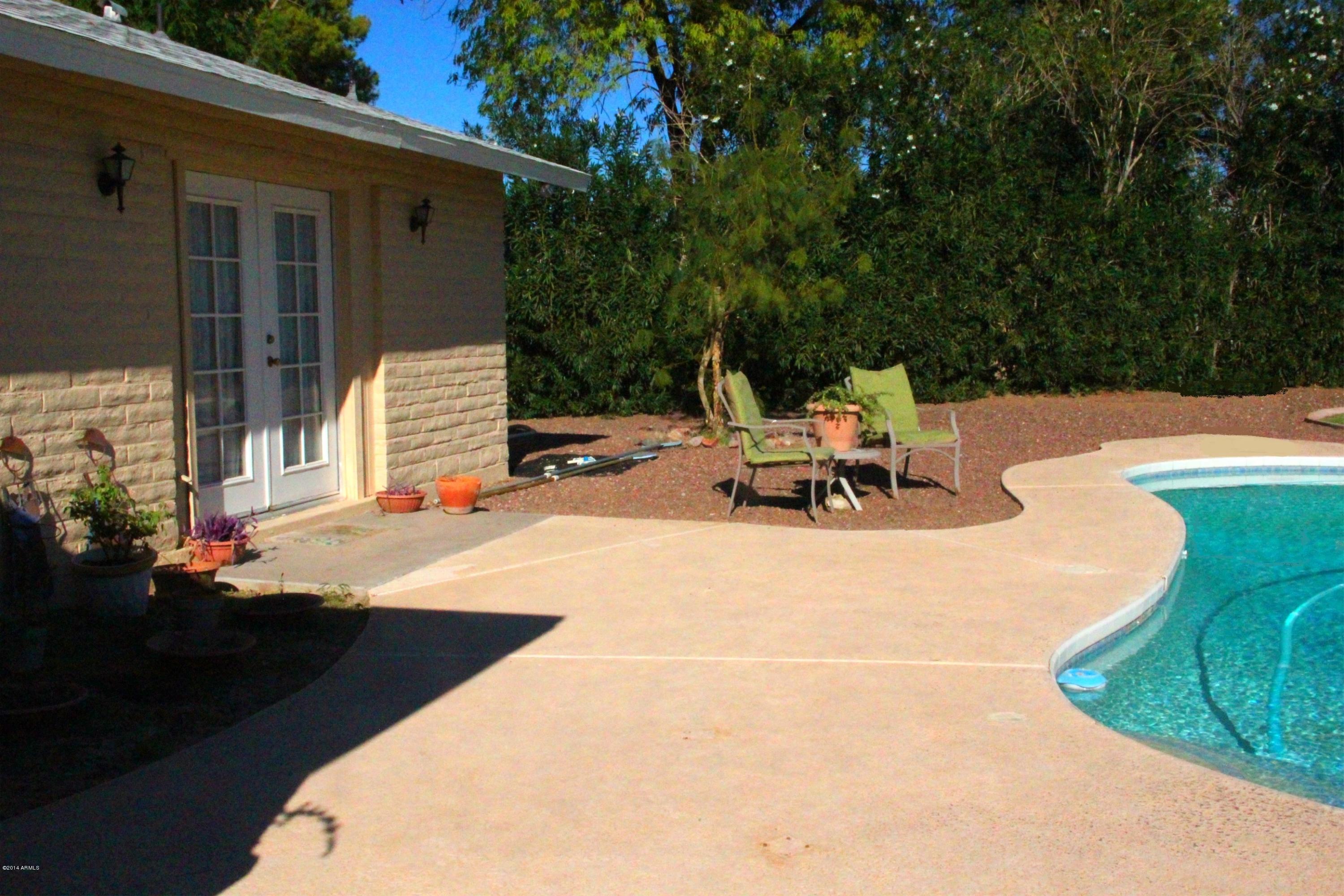 3915 West Calavar Road Phoenix, AZ 85053 - Photo 25 of 29 25-Master Suite Pool Access