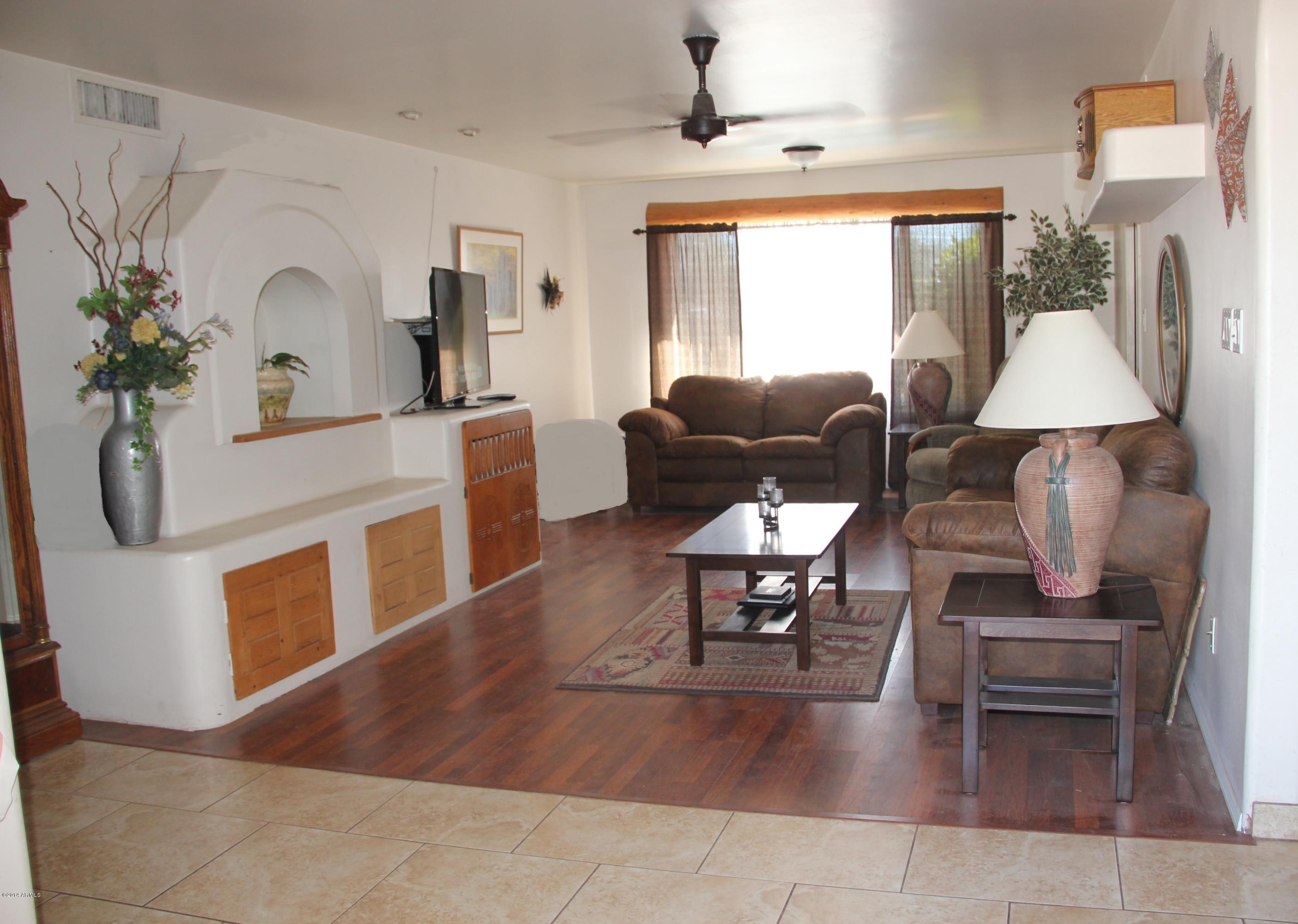 3915 West Calavar Road Phoenix, AZ 85053 - Photo 3 of 29 3-Living Room Front Entrance-1