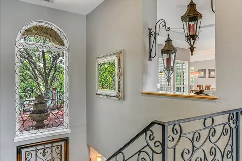 a view of front door with a tree