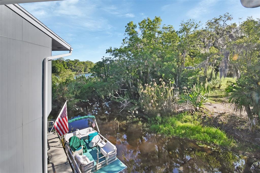 2329 River Ridge Road, Unit 4 DeLand, FL 32720 - Photo 21 of 23 a backyard of a house with outdoor seating