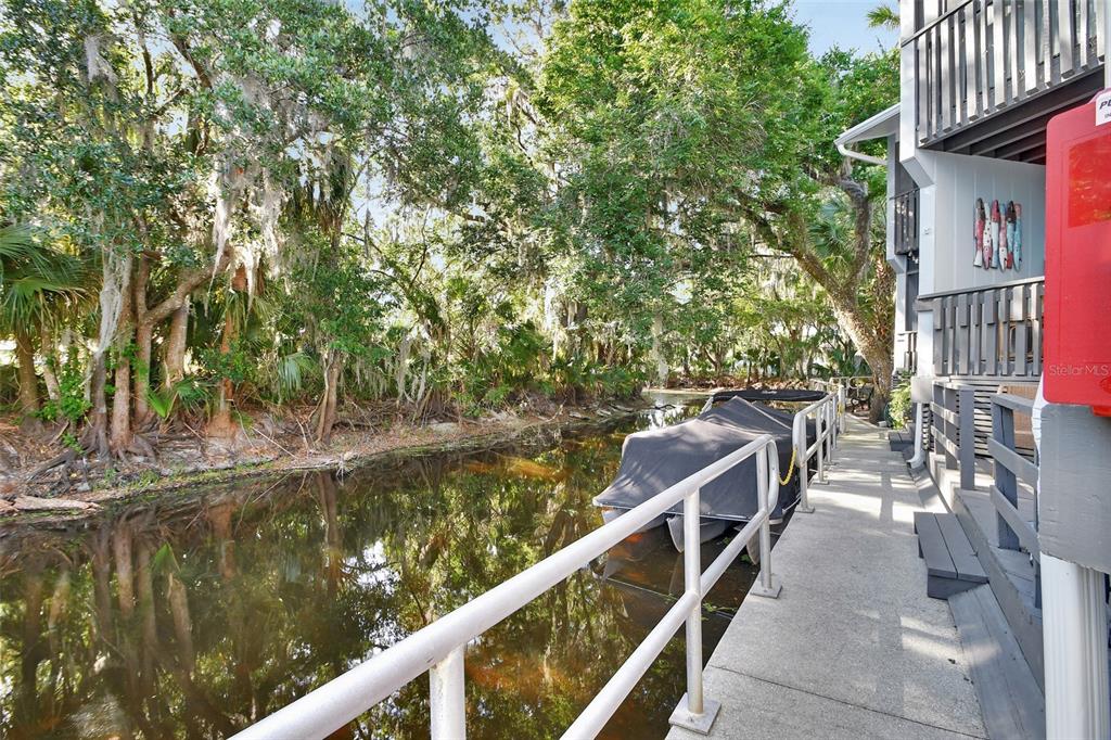 2329 River Ridge Road, Unit 4 DeLand, FL 32720 - Photo 23 of 23 a balcony with tall trees