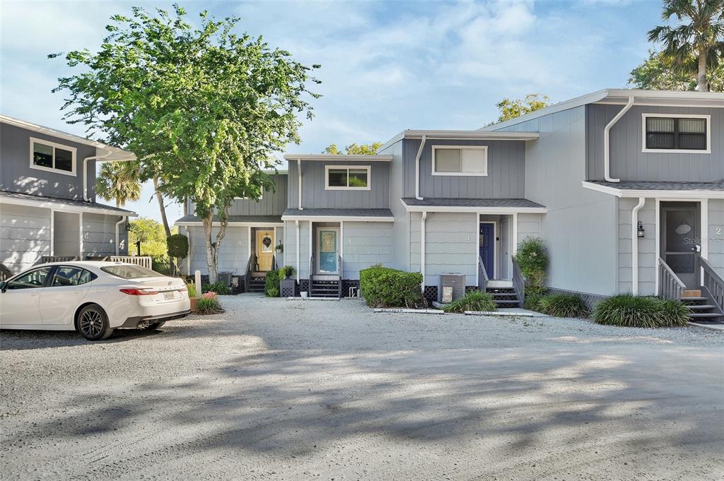 2329 River Ridge Road, Unit 4 DeLand, FL 32720 - Photo 3 of 23 a view of street with large house