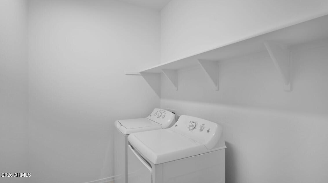 16340 South 182nd Drive Goodyear, AZ 85338 - Photo 14 of 38 a utility room with dryer and washer