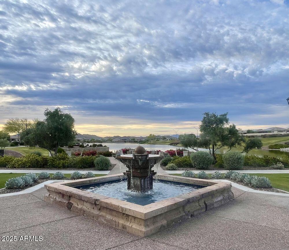16340 South 182nd Drive Goodyear, AZ 85338 - Photo 34 of 38 a view of a terrace with a garden and bench
