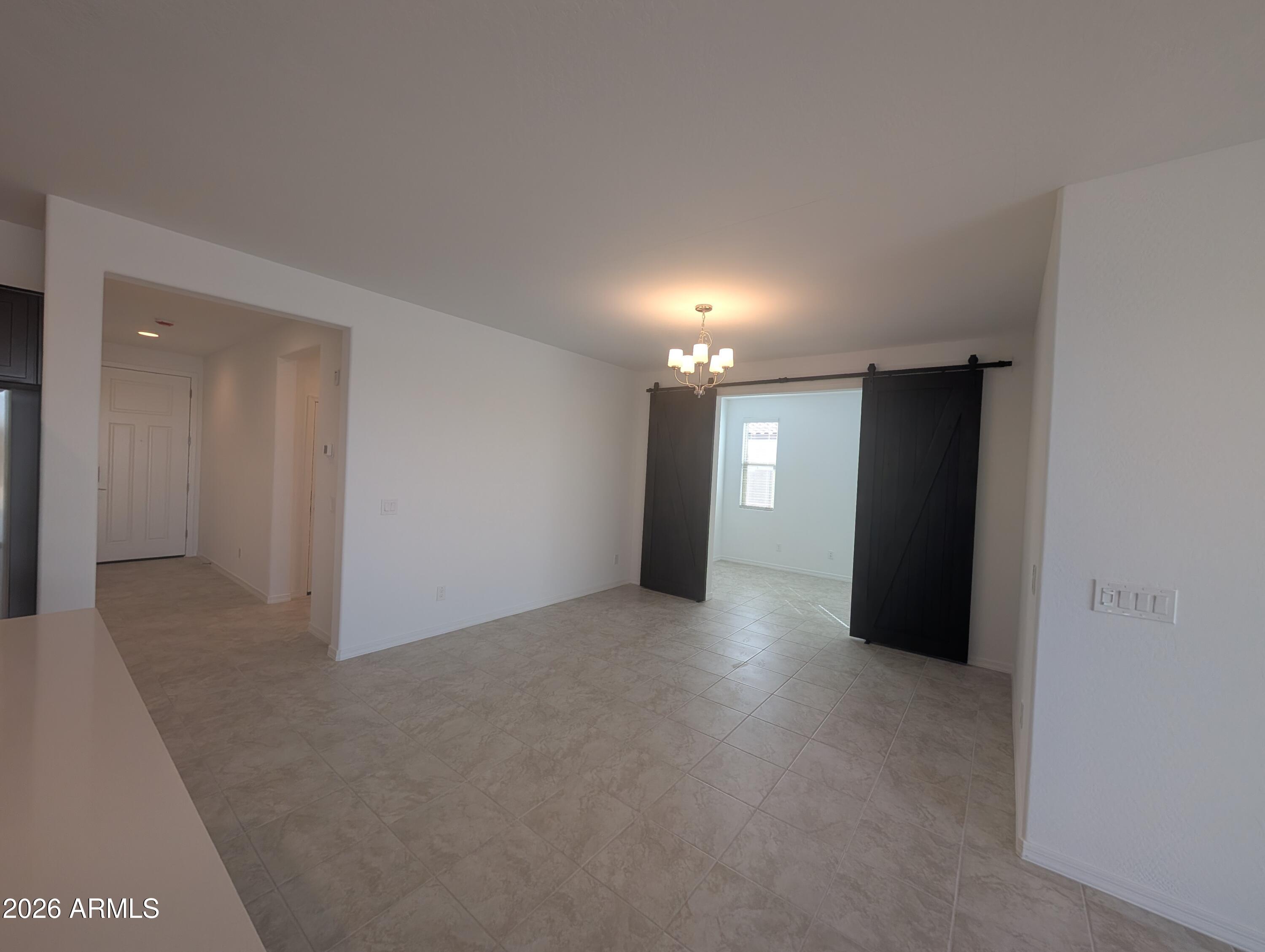 16340 South 182nd Drive Goodyear, AZ 85338 - Photo 7 of 38 a view of a big room with an entryway