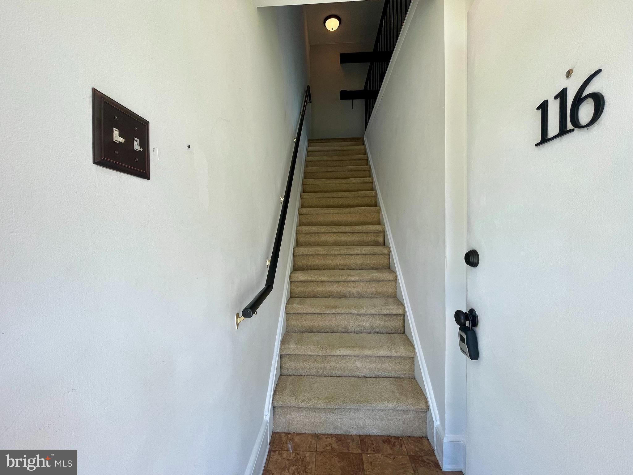 810 North Forklanding Road, Unit 116 Maple Shade, NJ 08052 - Photo 3 of 11 a view of entryway and hall with wooden floor
