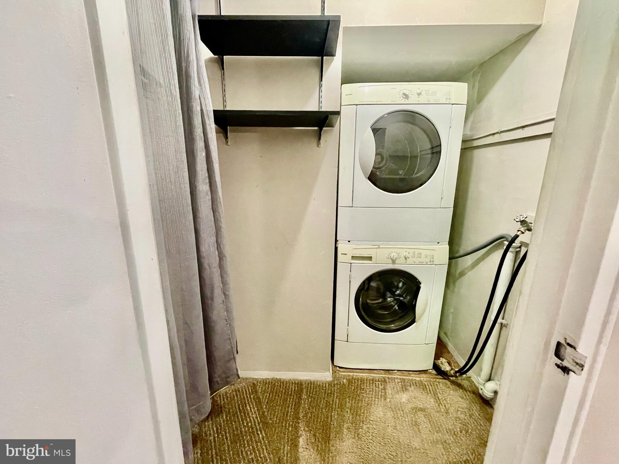 810 North Forklanding Road, Unit 116 Maple Shade, NJ 08052 - Photo 10 of 11 a bathroom with a sink and washing machine