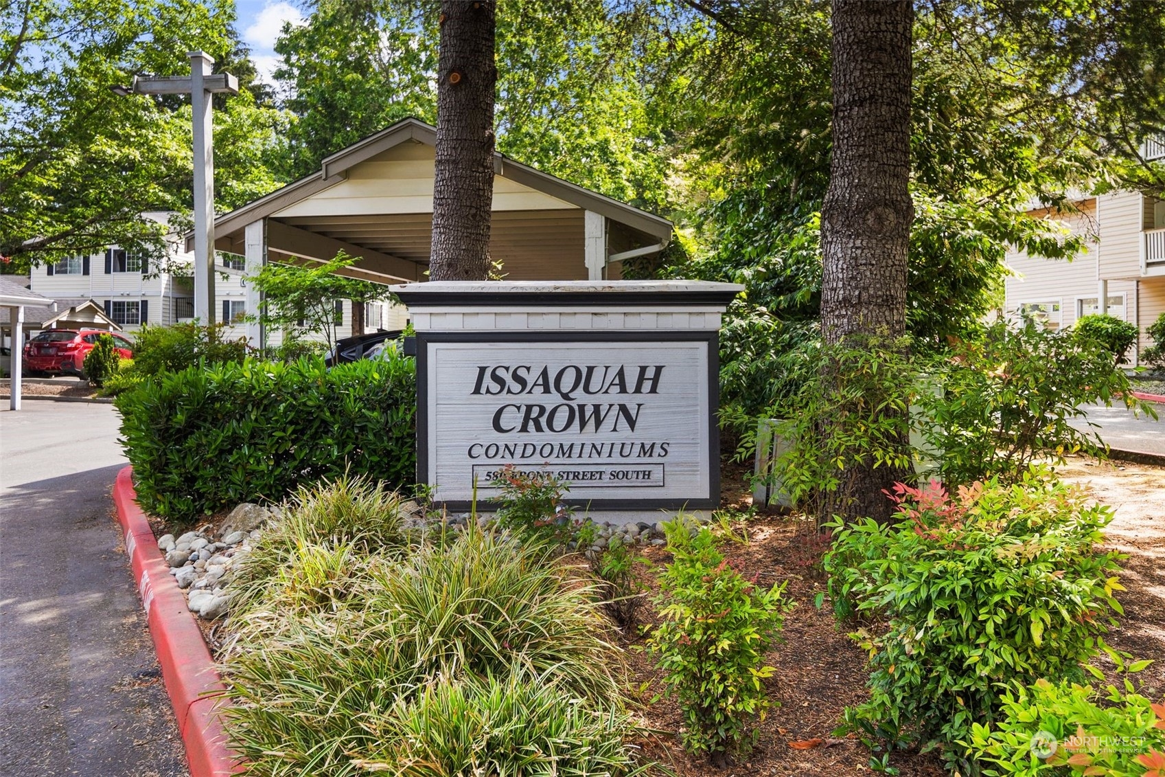 580 Front Street South, Unit C113 Issaquah, WA 98027 - Photo 2 of 31 a sign on the side of a building
