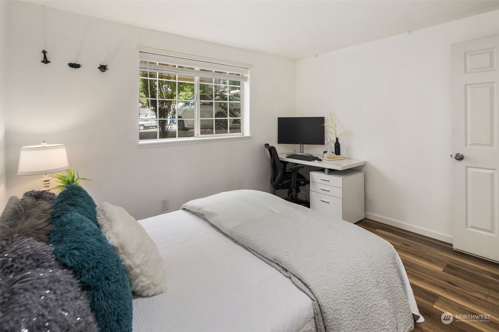 580 Front Street South, Unit C113 Issaquah, WA 98027 - Photo 23 of 31 a bed room with a bed and a window