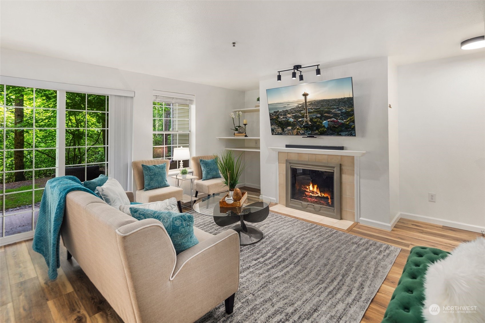 580 Front Street South, Unit C113 Issaquah, WA 98027 - Photo 6 of 31 a living room with furniture and a fireplace