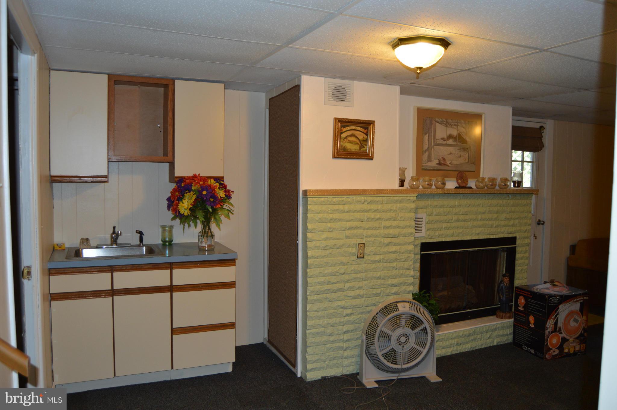 204 Harlem Road Pasadena, MD 21122 - Photo 15 of 20 Basement Kitchen Area