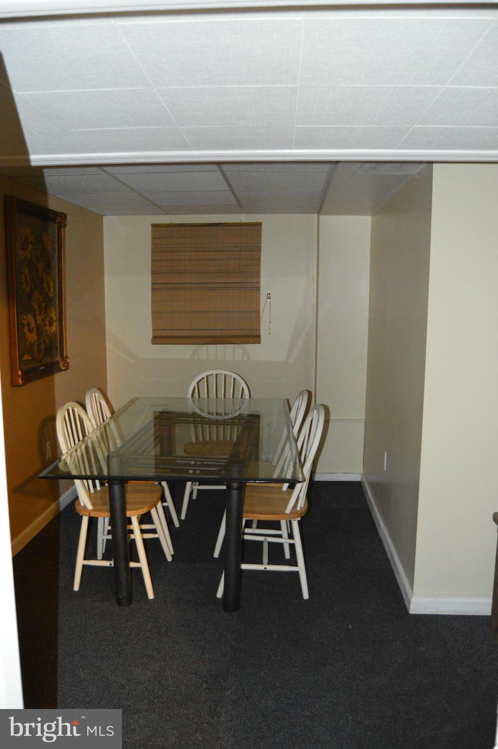 204 Harlem Road Pasadena, MD 21122 - Photo 16 of 20 Basement Dining Area