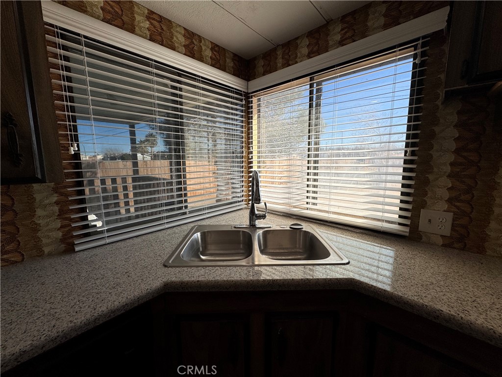 25544 Jasper Road Barstow, CA 92311 - Photo 11 of 61 View from kitchen window through new blinds