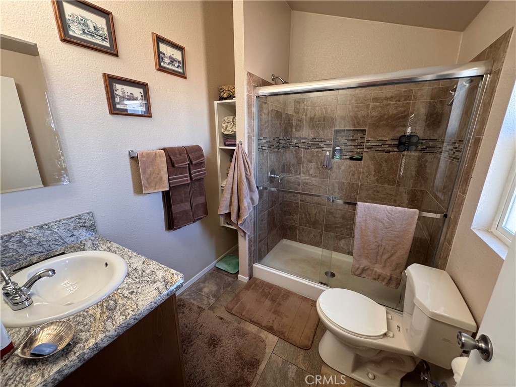 25544 Jasper Road Barstow, CA 92311 - Photo 45 of 61 Primary bathroom tile shower