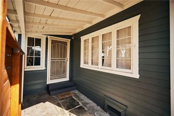 a porch with seating space
